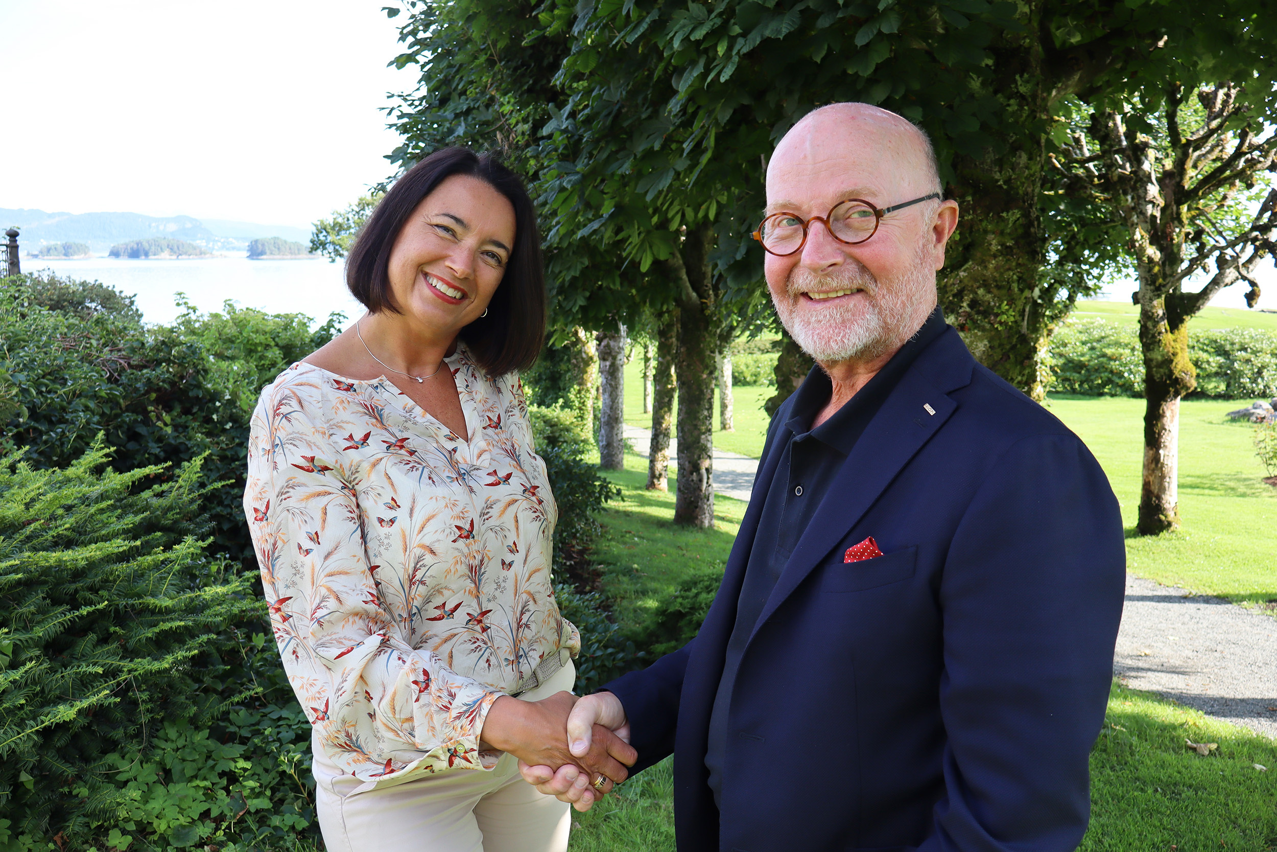 Pictureof Trine Lise Lundekvam Bergeand CEO Per Vultvon Steyernoutsideof Hotel Solstrand