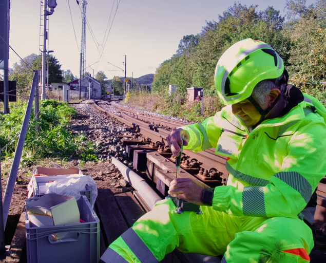 Arne Roger Janse, NORCE researcher Surya Kandukuri preparing a new sensor to be fitted on the bridge., ICE PPR Photo Katrine Jaklin NORCE 4, , 